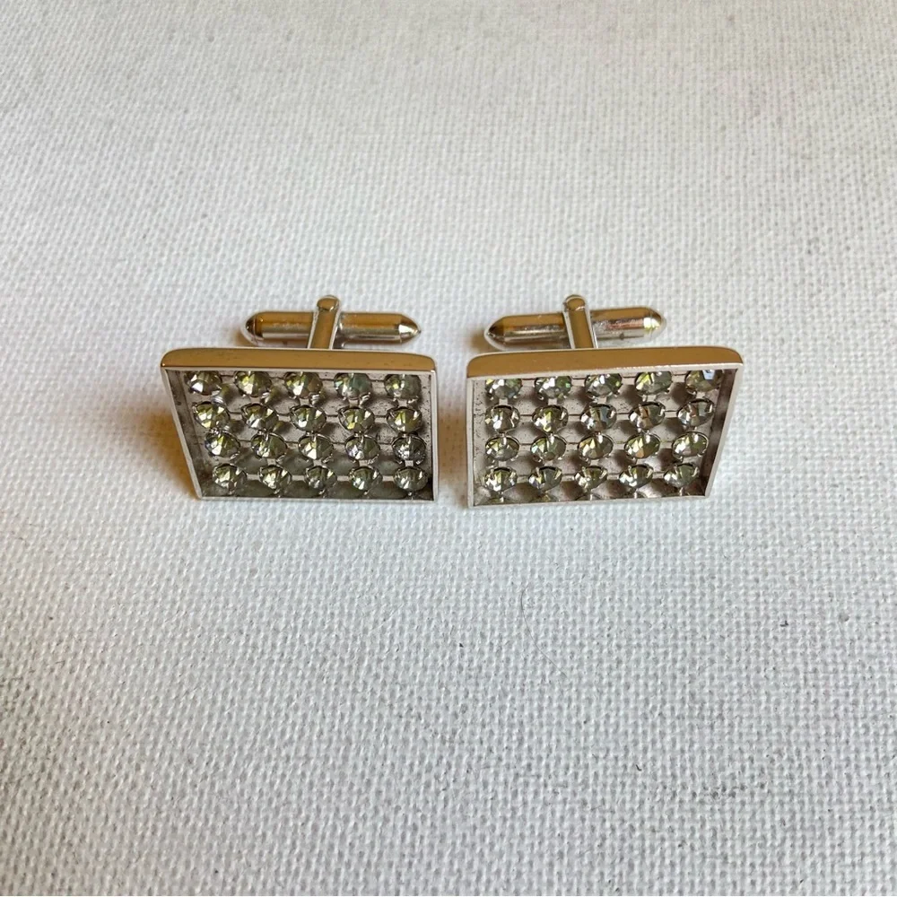 SWANK gray rhinestone cuff links in rectangular silvertone metal setting signed